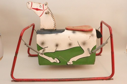 Rocking horse with spring