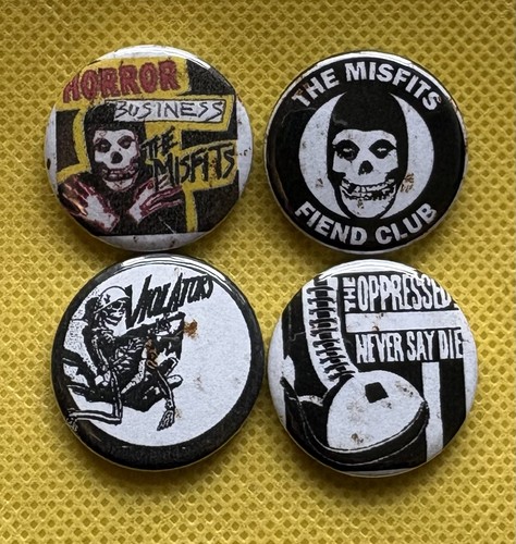 Four punk badges memorabilia - badges,