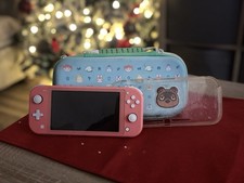 Nintendo Switch Lite 32GB Coral Pink with Animal Crossing game preloaded