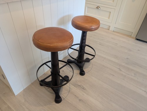 Tan leather cast iron - leather,
