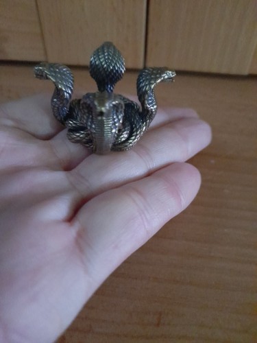 Four entwined snake brass - four,