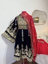 Navy blue and gold embroidered velvet Afghan dress with red scarf and trousers