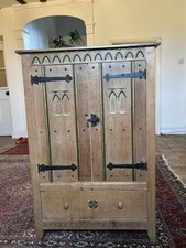 An Arts & Crafts Oak cupboard/