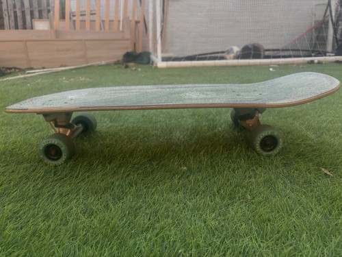 Green coloured skateboard deck