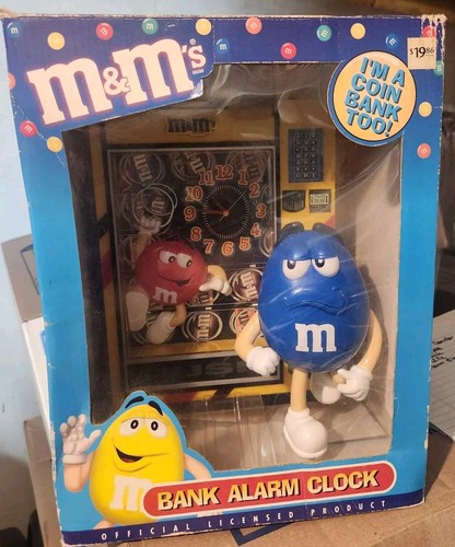Alarm clock and coin - m&m's,