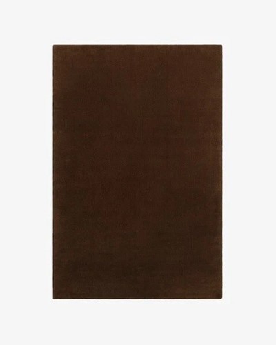 Brown hand tufted - hand,