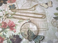 Gorgeous Magnifying Glass Pendant with Small AB Stone. Gold Tone Chain