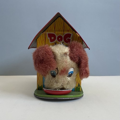 Vintage wind tin toy dog - up,