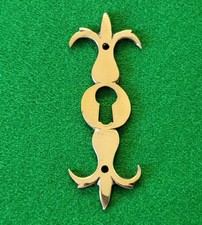 Brass trefoil escutcheon key