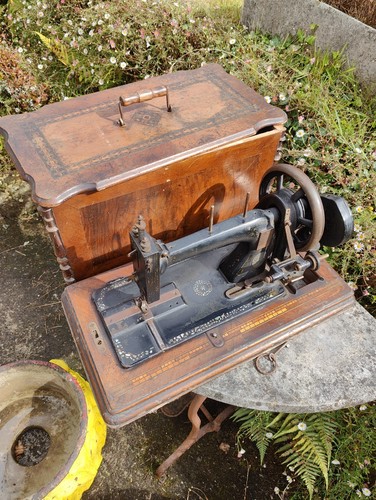 Antique sewing machine with - antique,