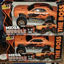 two Monster trucks Still In