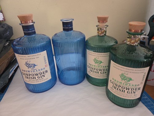 Empty gin bottles - empty,