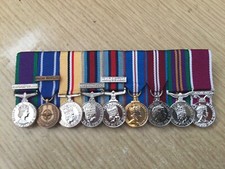 9 MINIATURE MEDALS COURT