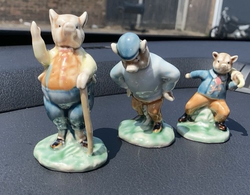 Three pigs porcelain ornaments - three,