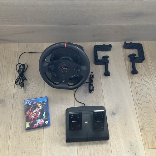 Steering wheel and pedals for