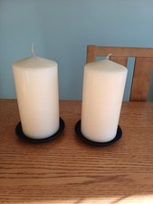 Pair of Large White Church Candles With Black Metal Bases