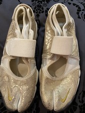 Nike Air Rift Metallic Gold