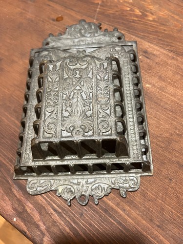 Ornate scroll work cast - scroll,