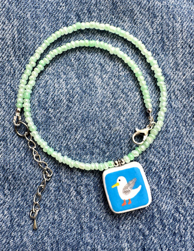 Green beaded necklace with - necklace,