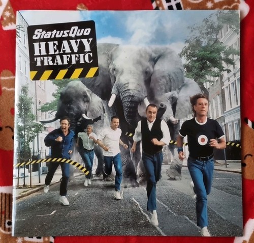 Status quo heavy - status, tour