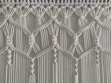 Macrame window curtain, wall