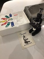 Vintage Microscope In Original Packaging And With Sample Slides
