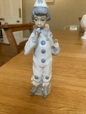 Cascades Porcelain Figure  Of A Clown Leaning On A Wall