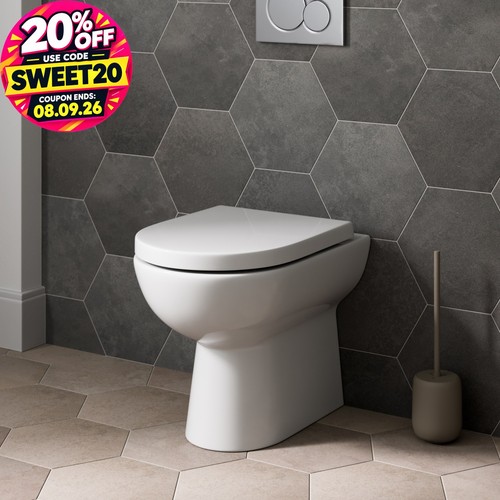Back wall btw toilet pan - back,