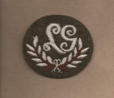 LG Trades badge on Khaki back