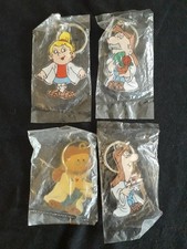 4 TETLEY TEA KEYRINGS (UNOPENED).