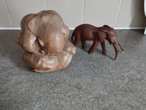 Wooden elephant weeping - elephant,