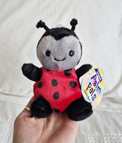 Aurora palm pals lil spots - "lil, spots"