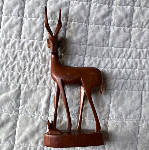 Carved wooden deer figurine - carved,