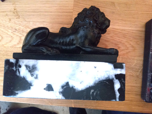 Black ceramic recumbent lion - ceramic,