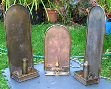 Trio of vintage brass candle