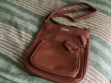 Handbag by natalie anderson colour is Tan