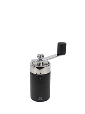 Manual wooden nutmeg mill in a