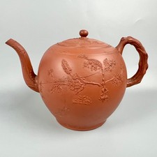 A rare oversized red stoneware sprigged Staffordshire punch pot and cover c1760