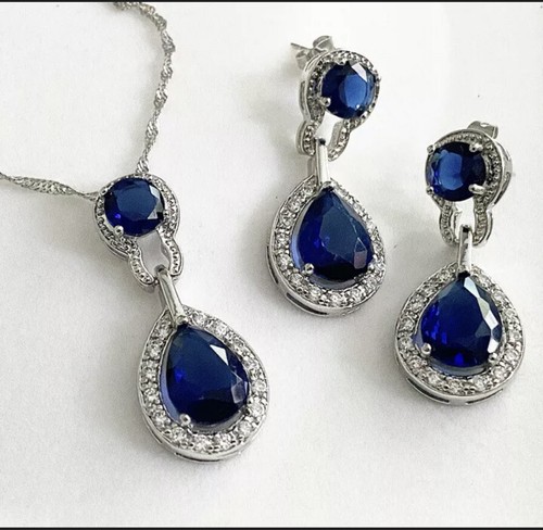 White gold finish pear cut - white,