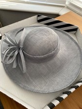 Alison Tod Hatinator in silver grey, with matching flower. 