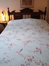 King Size Duvet Cover.  Colourful Birds & Butterflies on duck egg blue. .Dunelm.