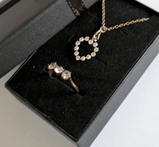 Vintage rolled gold ring and Sarah Coventry necklace