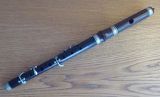 AN OLD WOODEN PICCOLO BY BESSON & Co LONDON