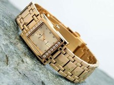 YVES CAMANI CALAIS WATCH. GOLD