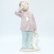 NAO Lladro Boy Holding Teddy