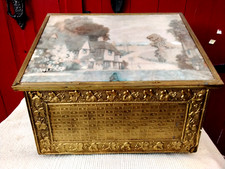 VINTAGE EMBOSSED BRASS ON WOOD