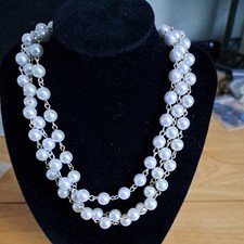  A Pair of Long Faux Pearl Necklaces. One Gold/One Silver - Used No.29