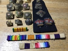 Small collection of British army officers rank insignia cloth and metal