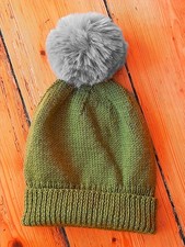 Hand knitted 100% Merino wool in Moss Green Size Small with detachable pom pom