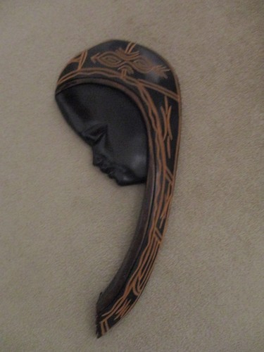 Carved wooden mask - carved,